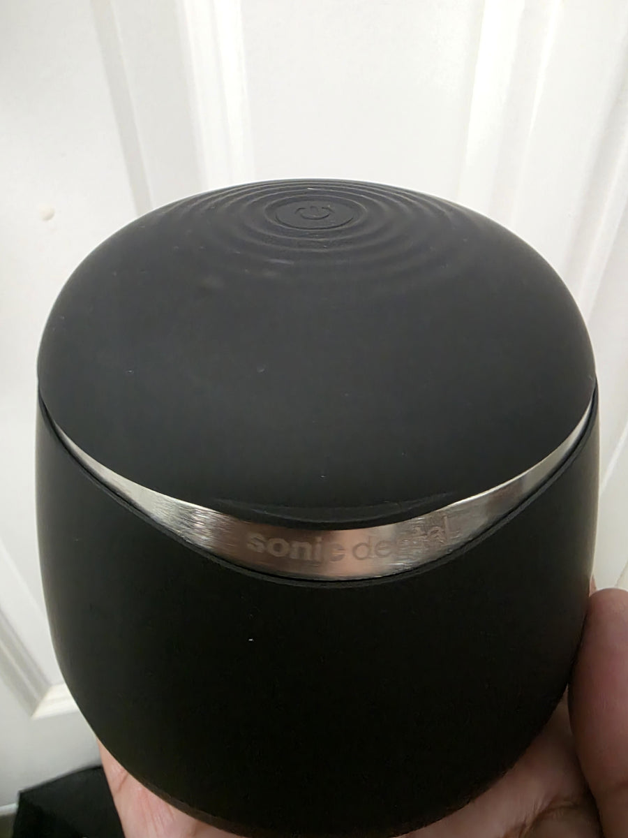 Customer close-up photo of a black Sonic Odyssey cleaner